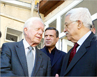 Jimmy Carter (L) is one of the election monitors 
