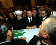 Eldest son Bahaa al-Din pays hislast respects before the burial
