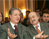 Jumblatt (R) and Amin al-Jumailhave openly blamed the Syrians