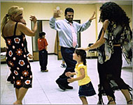 Third and fourth generation Arabsin Chile practise an ethnic dance