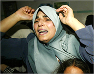 A Palestinian woman mourns thedeath of a Hamas fighter in Gaza