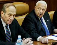Vice Premier Ehud Olmert (L) said Israel would fight