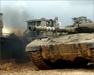 Israeli occupation forces werebacked by tanks and bulldozers