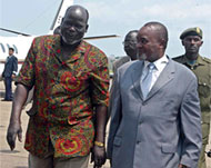Garang (L) was in Uganda to discuss ending a border rebellion