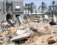 The rubble of a razed home remains in Dair al-Balah
