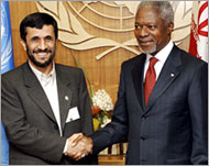 Ahmadinejad (L) suggested South Africa join nuclear talks