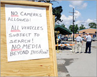A sign warns media at the entrance of a Louisiana morgue