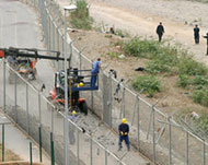To date, fourteen immigrants have died scaling border fences
