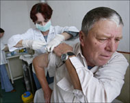 A man gets anti-flu vaccination near Romania's Danube delta