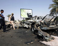 Vehicles were destroyed in an attack on a Baghdad checkpoint 