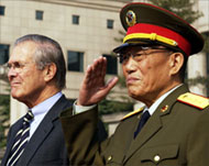 Donald Rumsfeld (L) complained about the US being sidelined