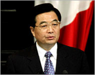 Hu Jintao decried the widening gap between rich and poor states