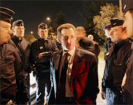 Interior Minister Nicolas Sarkozyspeaks with police in Toulouse