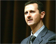 President Bashar al-Assad says the US is discrediting Syria