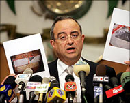 
Marwan Muasher showed picturesof the bomb-belt Marwan Muasher showed picturesof the bomb-belt 