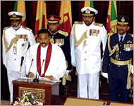 Rajapakse (C) said the Norwegianled peace talks had shortcomings