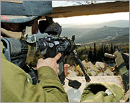 Israeli soldiers are posted along the border with Lebanon