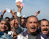 Brotherhood supporters protest at an Alexandria voting station 