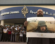 Aljazeera staff protested in Dohaand in overseas bureaus