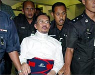 Anwar was beaten up after his arrest in 1998
