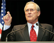 Rumsfeld says US troops need only report the abuse not stop it