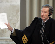 Ramsey Clark has criticised theproceedings as chaotic 