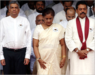 Kumaratunga (C) has ruled outthe idea of a Tamil homeland