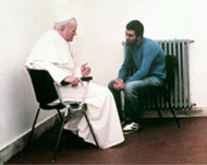 The pope met Agca in an Italianprison in 1983 and forgave him
