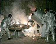 Workers at a uranium processing site in Isfahan  