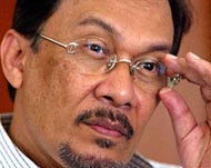 Anwar accused Mahathir of defamation