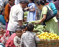 Kathmandu residents buy produceafter a curfew was lifted Wednesday