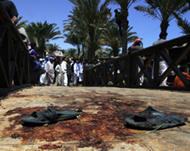 Sandals remain in a pool of blood after the Dahab bombings