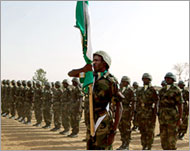 Nigerian (AU) soldiers parade at a base in western Darfur state (file)