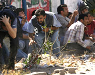 Civilians duck during clashesbetween Fatah and Hamas 