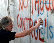 Waters paints graffiti at Israel's barrier surrounding Bethlehem 