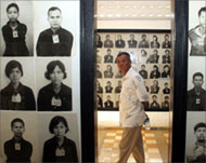 Pictures of victims adorn theformer Tuol Sleng torture centre