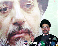 Baqir al-Hakim (background) was killed on August 29, 2003