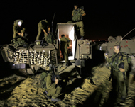 Isreali soldiers prepare for ground offensive on June 28