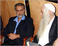 Rabbi Froman with Darwish (left)