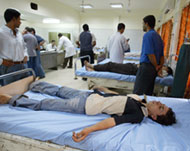 A boy receives treatment after the al-Sabah blast