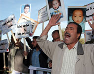 Familes of the infected have protested outside the court