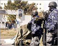 Special forces police guard the state security court in Amman