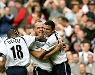 Spurs celebrate only their secondwin of the season