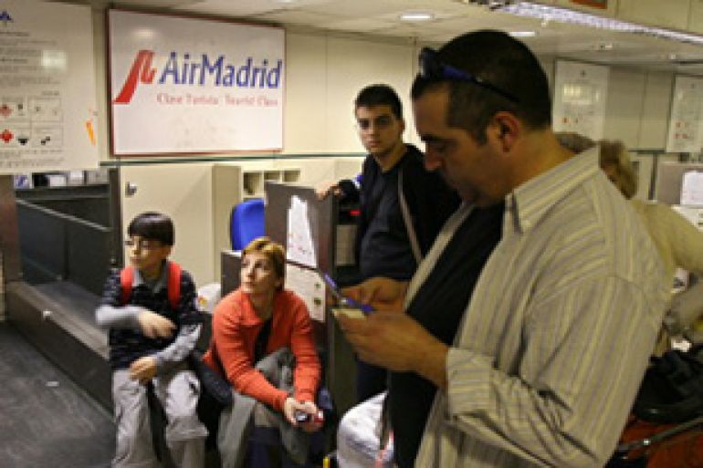 Spanish airline Air Madrid's passengers are stranded at Barajas airport in Madrid
