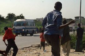 Protesters throw stones in Mogadishu
