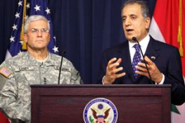 US Ambassador to Iraq Zalmay Khalilzad (R) speaks during a joint press conference with US General George Casey