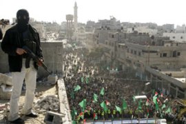 Hamas fighter guards rally in Gaza