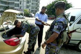 Sri Lanka soldiers search people in Colombo