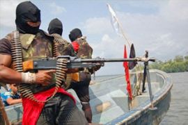 niger delta rebels strike winsome pose