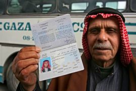 Refugee shows passport Gaza